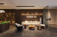 โรงแรมมู่เจียงหนาน (สาขา สถานีรถไฟความเร็วสูงตะวันออก รัฐบาลเขตตั้งถู ม่านซาน)