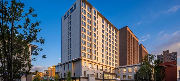 Yining Xinyi · Mingtin Hotel (Wanrong Plaza Yili Yining International Airport) Hotéis em Gulja