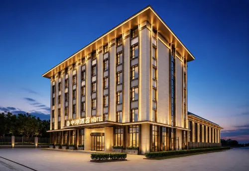 Huanren Zhongkun Hotel - parking