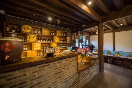 Huamushe Inn Отели рядом с достопримечательностью «Nine-Tripod Dragon Pond»