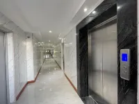 Jiangmen Yiwan Apartment with Elevator (Jiangmen East Railway Station Jianghai Square) - Inns