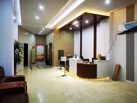Xingren Back Garden Hotel (Wenhua South Road) Отели в г. Синжэнь