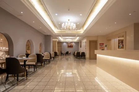 Vienna International Hotel Отели в г. Лунлинь