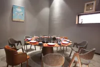 Rizhao Shangshuishanye1977 Art Hotel Отели в г. Ричжао