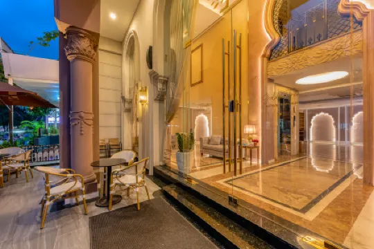 Golden Tree Hotel & Apartment Отели рядом с достопримечательностью «Выставка и конвенционный центр Сайгон»