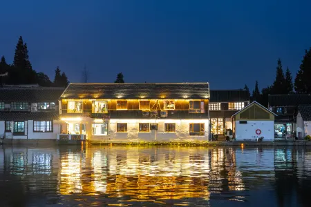 Floral Hotel · Dongjing hotel Отели рядом с достопримечательностью «China Ordnance Expo»