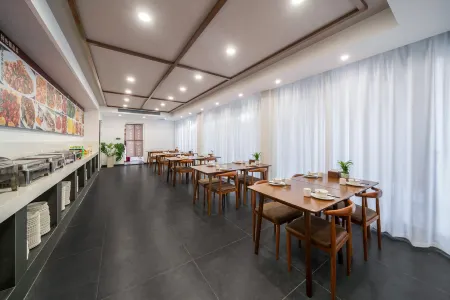 Jiuhe Chuxin Inn Отели рядом с достопримечательностью «Taierzhuang Ancient Town»