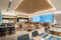 Echarm Hotel (Maoming Xinyi Convention Center Douzhouli Cultural and Creative Street)