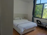 Xingzuo Wenquan Homestay - Inns