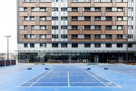 CJIA Premium Apartment (Xiongan Shangwu Fuwu Center) Отели рядом с достопримечательностью «Jinhu Park»