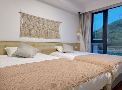 嵊泗拾久Meeting·度假民宿 （南長途沙灘店）