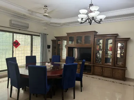 Huaxiaqing Inn Отели рядом с достопримечательностью «Shakarparian National Park»