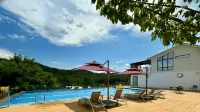 Zhihuilin Zhuyujian Homestay - สระว่ายน้ำบนดาดฟ้า