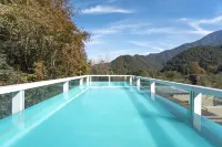 Yiliangfeng Mountain View Vacation Homestay (Longmen Mountain Apricot Plum Peak Scenic Area Branch) - مسبح على السطح