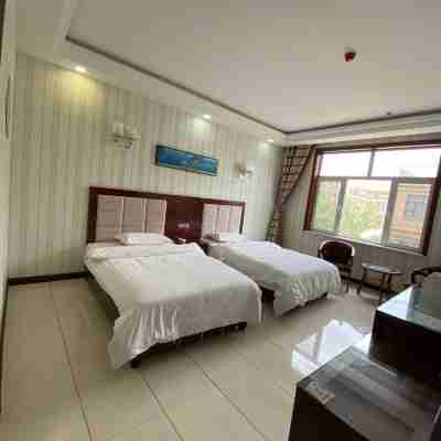 Congcong Nanian Hotel Rooms