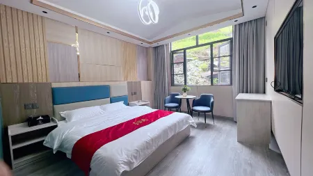 Dingjie Yijiangnan Hotel Отели в г. Динцзие