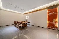 Muxi Hotel (Lanxi Baolong Plaza Store)