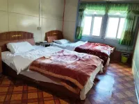 Mainling Gesangla Homestay (Gangpai Gong Road) فنادق في ميلين