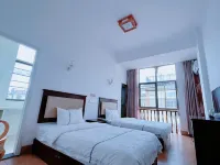 Yiliang Jiulong Tushun Hotel