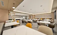 Greentown Hotel (Aksu Jinhuan Plaza Branch) - พร้อมอาหารเช้า