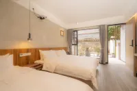 Xinchang Hanxiao Flowers Blossom Longxigu Homestay - مطابخ