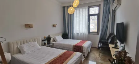 Cozy Courtyard View B&B (Xifu Old Street Branch) Отели рядом с достопримечательностью «Jintai Taoist Temple»