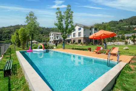 Yichang Monai Garden French Manor Homestay Отели рядом с достопримечательностью «The Xiling Gorge “Happy Valley”»