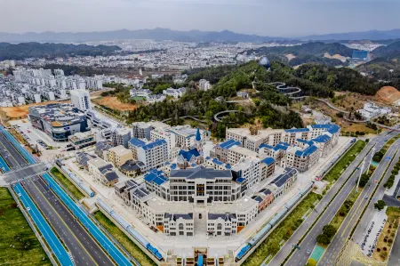 Wuyuan Jindu Mihe Hotel (Wuyuan High-speed Railway Station Branch) Отели в г. Уюань