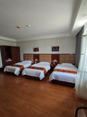 Ejina Qi Taibo Business Hotel - parkir