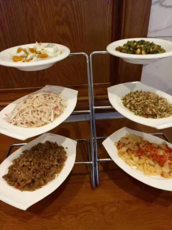 Guannan Guocheng Holiday Hotel Отели рядом с достопримечательностью «Er'langshen Culture Relics Park»