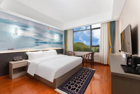 Banyan Tree. Wuyungu Hotel (Kangding Xinduqiao Branch) Отели рядом с достопримечательностью «Miles Corridor»