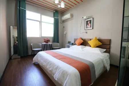 Xinzheng Qingyun Xiaozhu Homestay (Xias College) Отели рядом с достопримечательностью «Yanhuang Square»