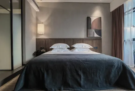 Tiwoli Terrace Hotel (University City Exhibition Center) Отели рядом с достопримечательностью «Li Zhuang Lv You»