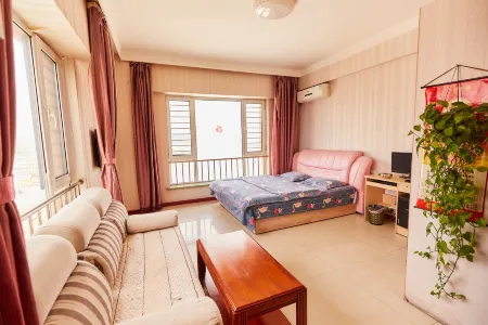 Fengcheng Yuzi Theme Apartment Отели в г. Фенчен