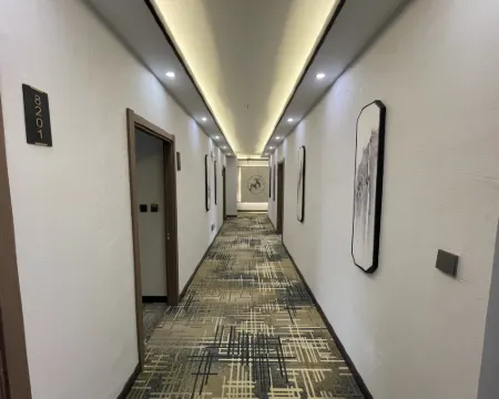 Yongxin Business Hotel โรงแรมในไถ้หลาย