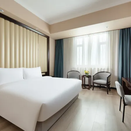 Madison Hotel Shanghai Baoshan Wanda Plaza Отели рядом с достопримечательностью «Шанхай коммуникейшенс Политекник»