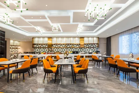 Magnotel （Business）Zaozhuang Wuyue Plaza Hotel Отели рядом с достопримечательностью «Guanshi Durian Garden Tourist Resort»