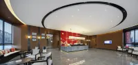 Qianna Hotel (Honor New World Shopping Center Longhu Park Branch) Hotels in Xixian