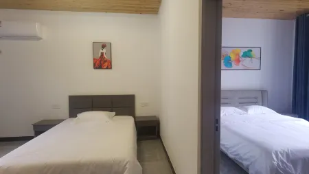 Enshi Qinhe Xiaoyuan Homestay Отели рядом с достопримечательностью «Enshi Suobuya Stone Forest Scenic Area»