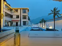 Lu Shi Tao man Jia Rong Jing min su Hoteles en Lushi