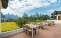 Yuetian Life Hotel (Yangshuo Shili Gallery Yulong River Branch) - พร้อมอาหารเช้า
