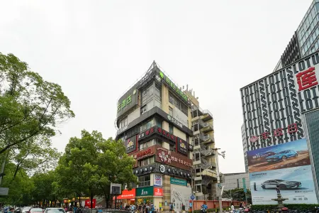 Pebble Motel (Shanghai Pediatric Hospital Lianhua Road Subway Station Branch) Отели рядом с достопримечательностью «Nanfang Xiuxian Guangchang Taiwan Fengqing Street»