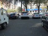 Shell Chain Hotel (Mudanjiang North Railway Station Guangsha Branch) - parking