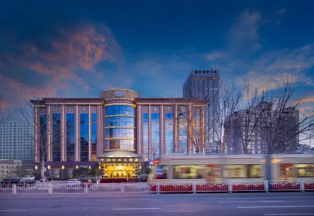 Dalian Shizhou Yunshui Hotel (Dalian Xi'an Road Subway Station Branch) Отели рядом с достопримечательностью «Dalian University of Technology»