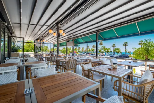 Pearly Hotel Отели рядом с достопримечательностью «Пляж Коньяалты»