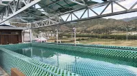 Longjiang Hot Spring Inn - avec sources thermales