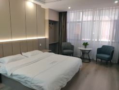 Qiqi Hotel (Longnan High-Speed Railway Station First People's Hospital)