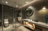 DeXin JunTing Hotel (Wenzhou South Railway Station Yintai Department Store Branch)