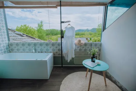 Jinyun Photography Theme Inn (Xiandu Scenic Area Branch) Отели рядом с достопримечательностью «Zhutan Mountain»