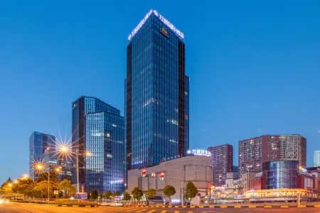 Guiyang Wanyi International Hotel (Guanshanhu Park Lincheng West Road Subway Station Branch) Отели рядом с достопримечательностью «Guiyang Kangyang Vocational University»